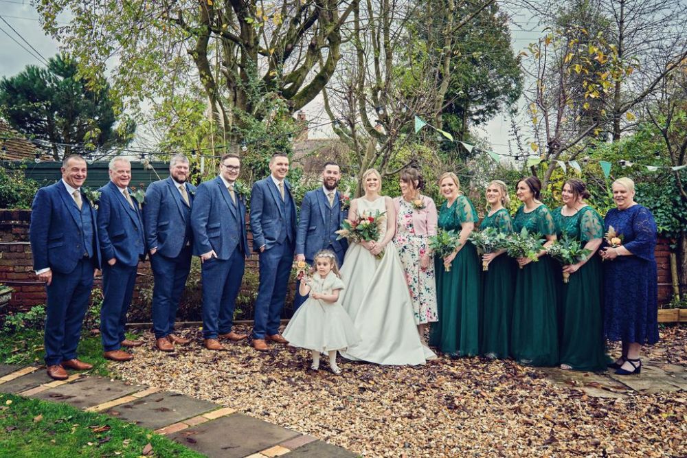 The happy couple with their wedding party.