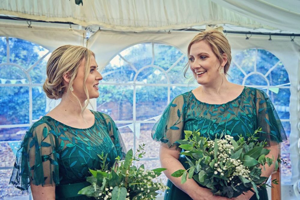 Bridesmaids in green dresses