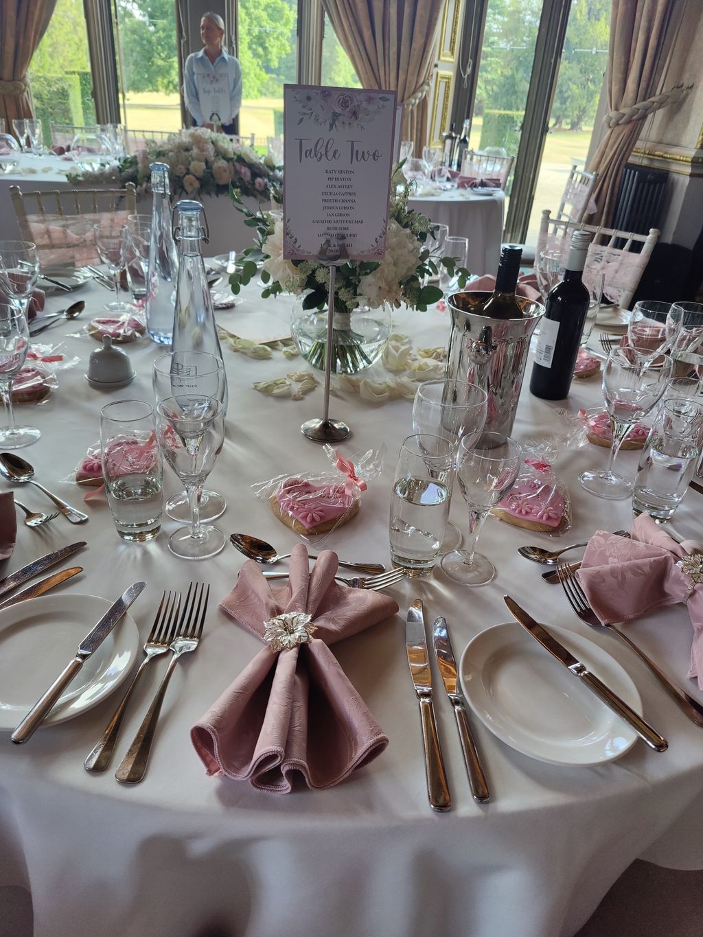 Dusky pink wedding reception tables